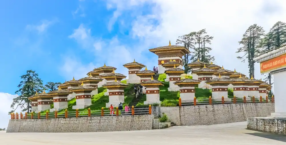 The 108 Druk Wangyal Chortens at Dochula Pass, a dramatic and spiritual landmark for a Bhutan photography tour.