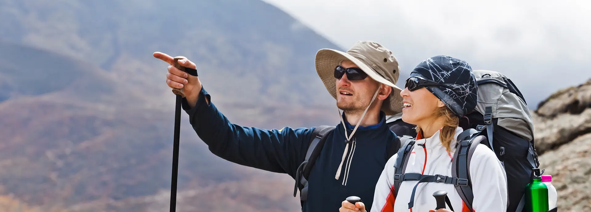 Couple hiking in himalayas mountains in Nepal