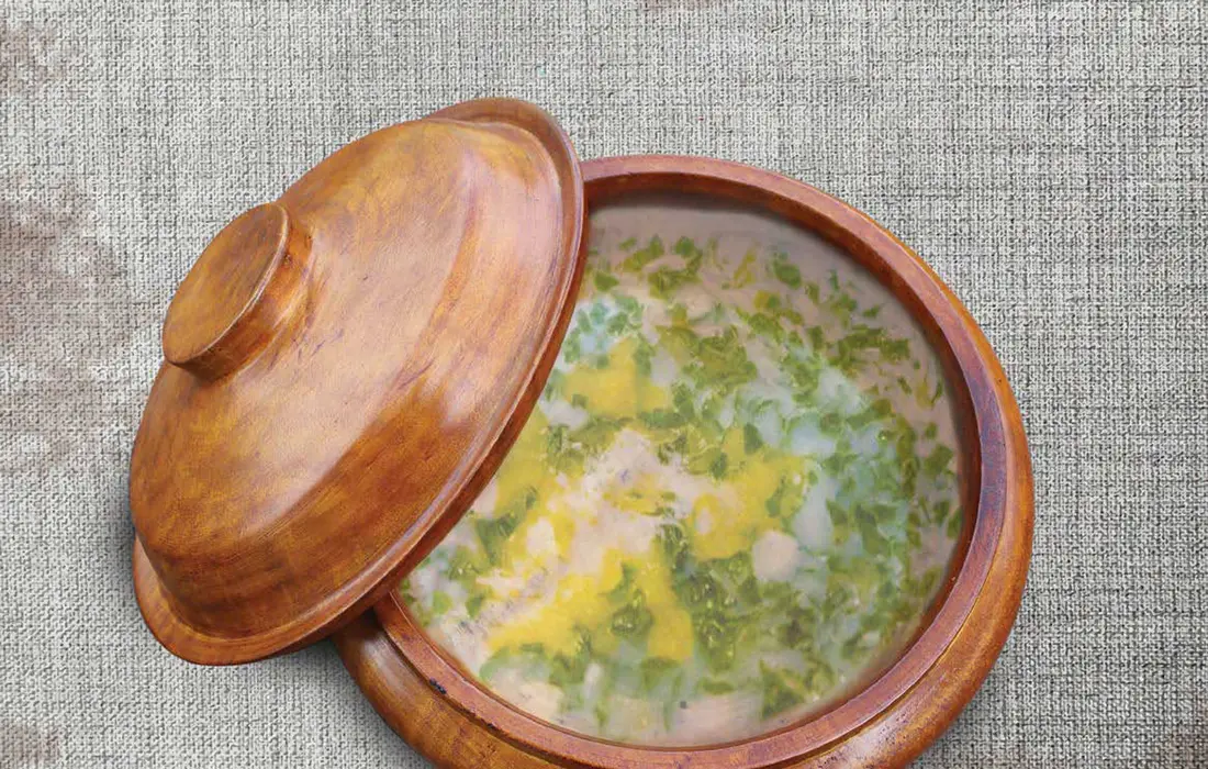 Traditional Bhutanese soup served in wooden bowl, ideal for Bhutan travel for senior travelers