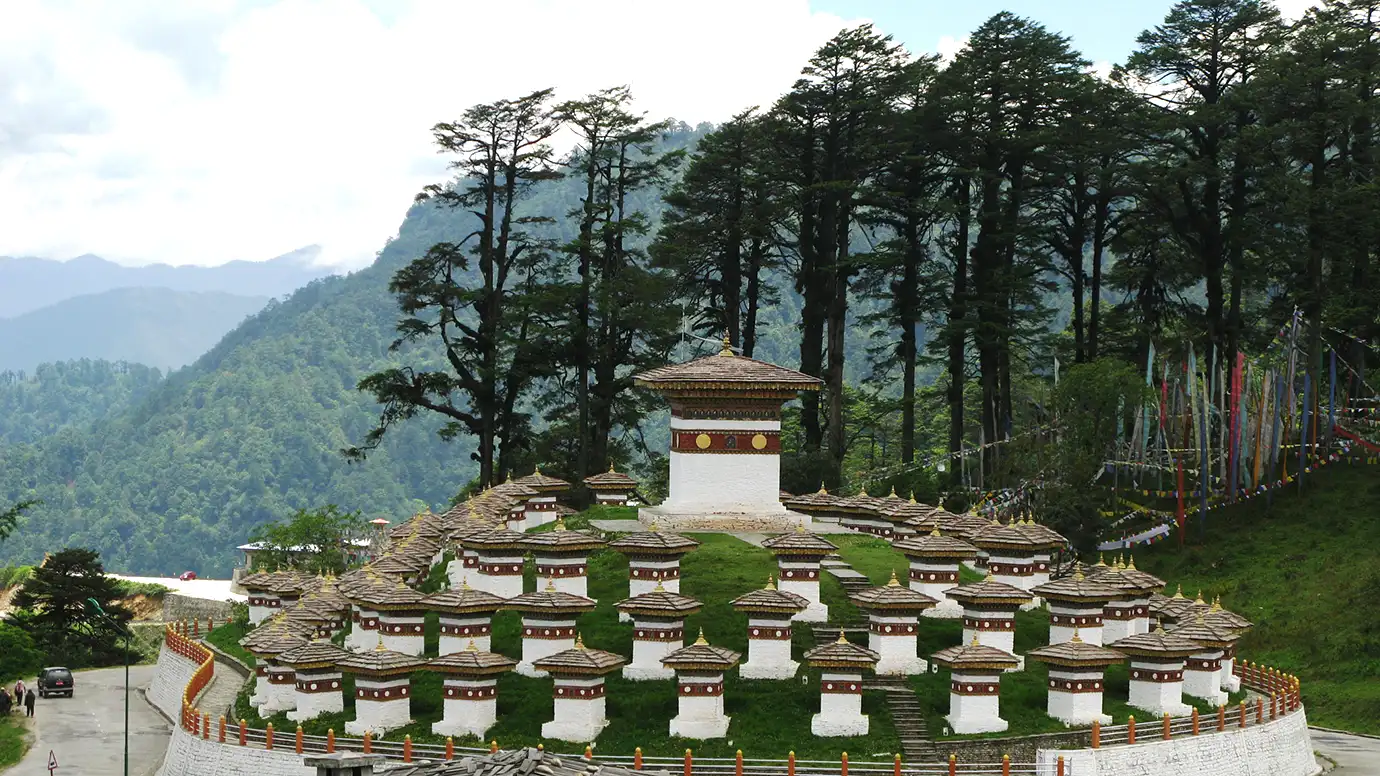 108 Druk Wangyal Chortens at Dochula Pass in Bhutan with Himalayan mountain views.