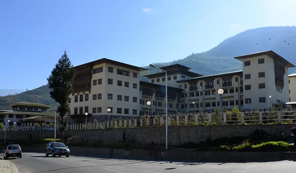 The modern Jigme Dorji Wangchuck National Referral Hospital in Thimphu, a key safety landmark for Bhutan family travel.