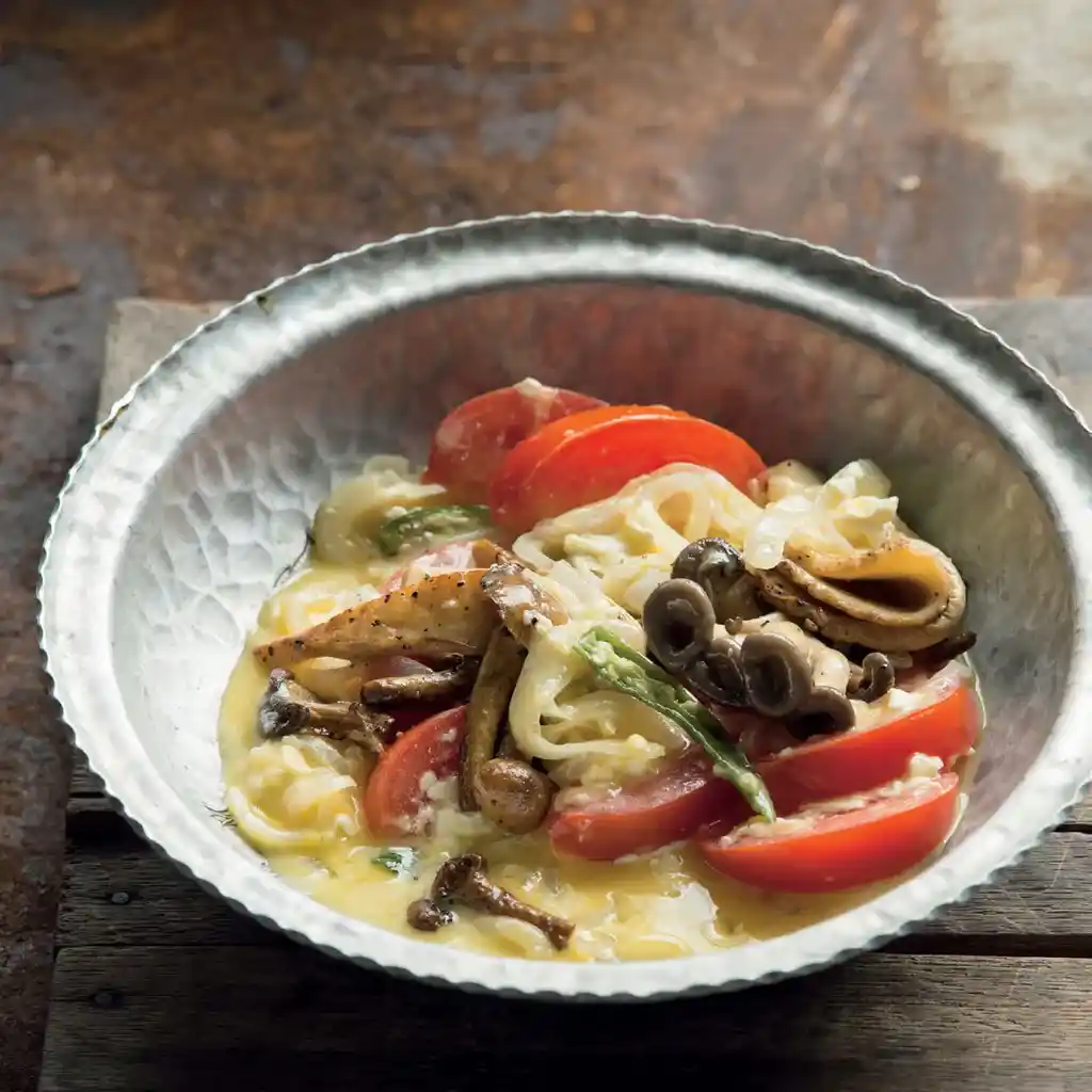 Traditional Shamu Datshi with mushrooms, cheese, and chili served during Bhutan Off-Season Travel, highlighting authentic Bhutanese comfort food.