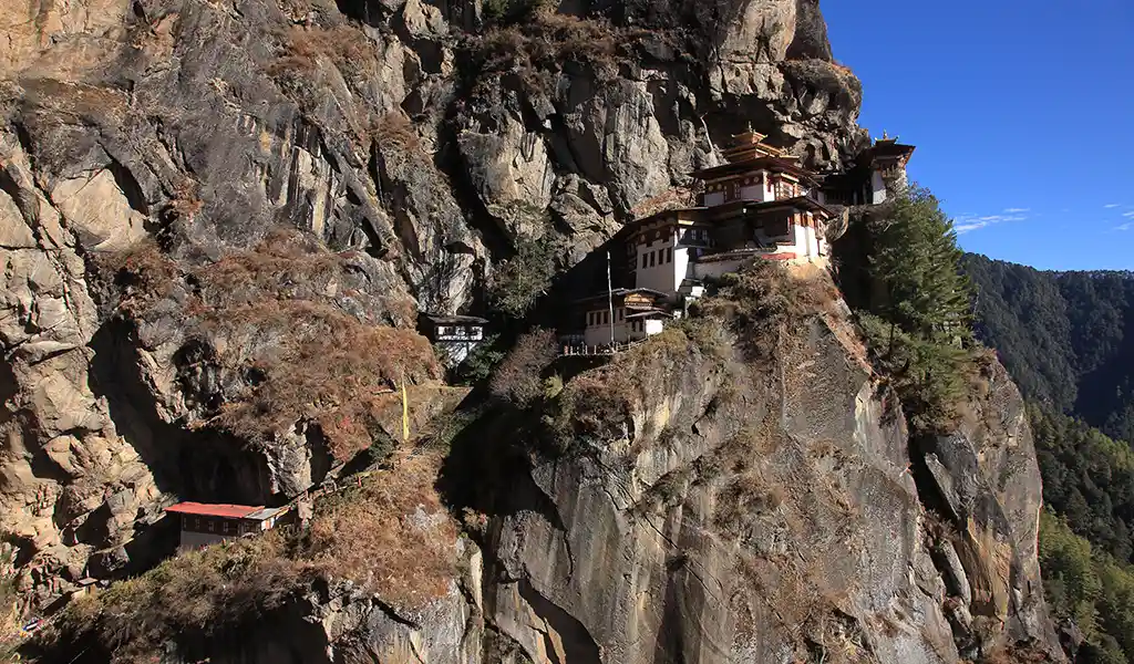 The Tiger's Nest Monastery complex built into a granite cliffside in Paro, Bhutan.