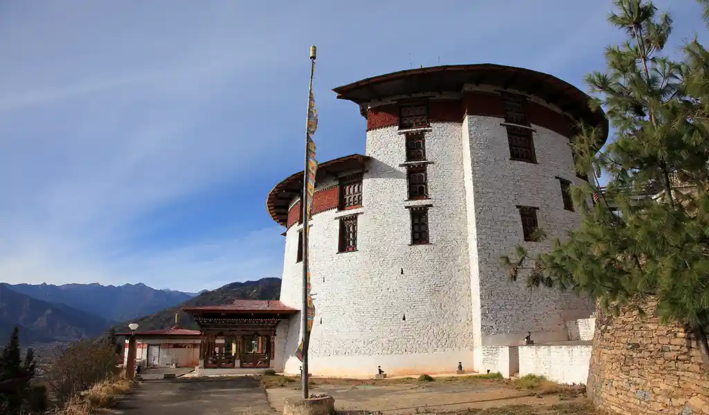 The National Museum of Bhutan, a historic circular watchtower in Paro, featured in a Paro travel guide for its cultural heritage.