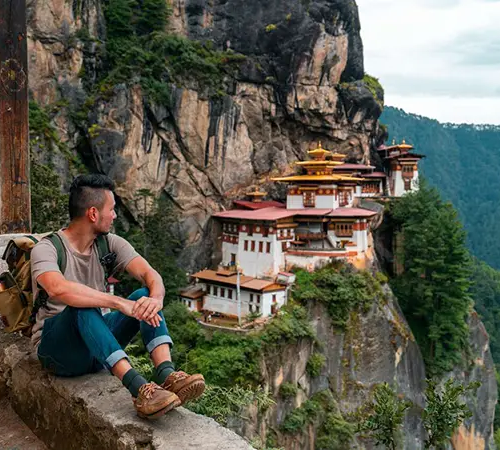 Traveler overlooking Tiger’s Nest Monastery after receiving Bhutan travel permits