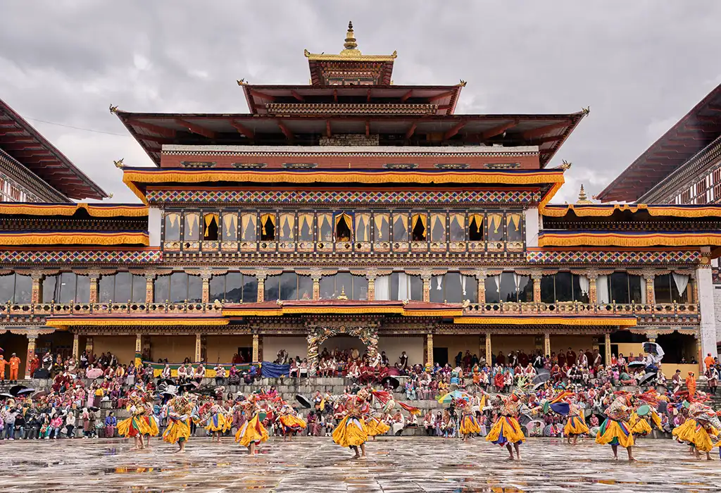 Traditional mask dance performance during Thimphu Tsechu festival in Bhutan highlighted in Bhutan travel tips for cultural experiences.