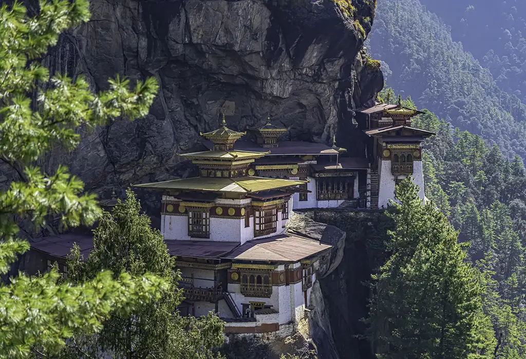 Tiger’s Nest Monastery perched on a cliff in Paro Bhutan, a must-visit landmark often highlighted in Bhutan travel tips.