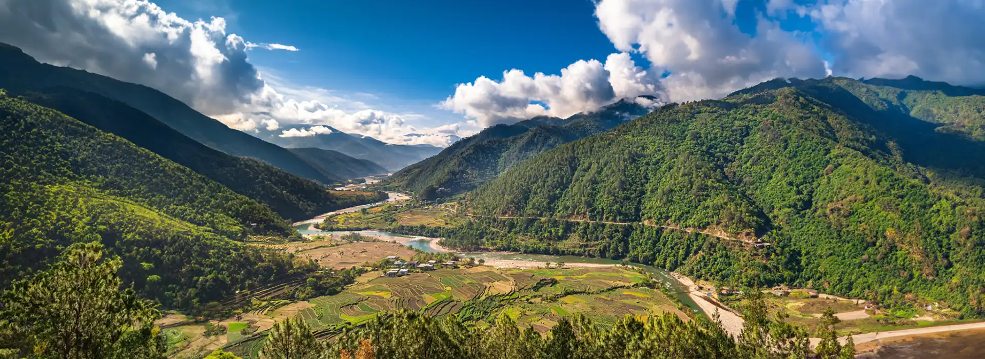 Scenic Bhutan valley and river landscape ideal for Bhutan travel for senior travelers