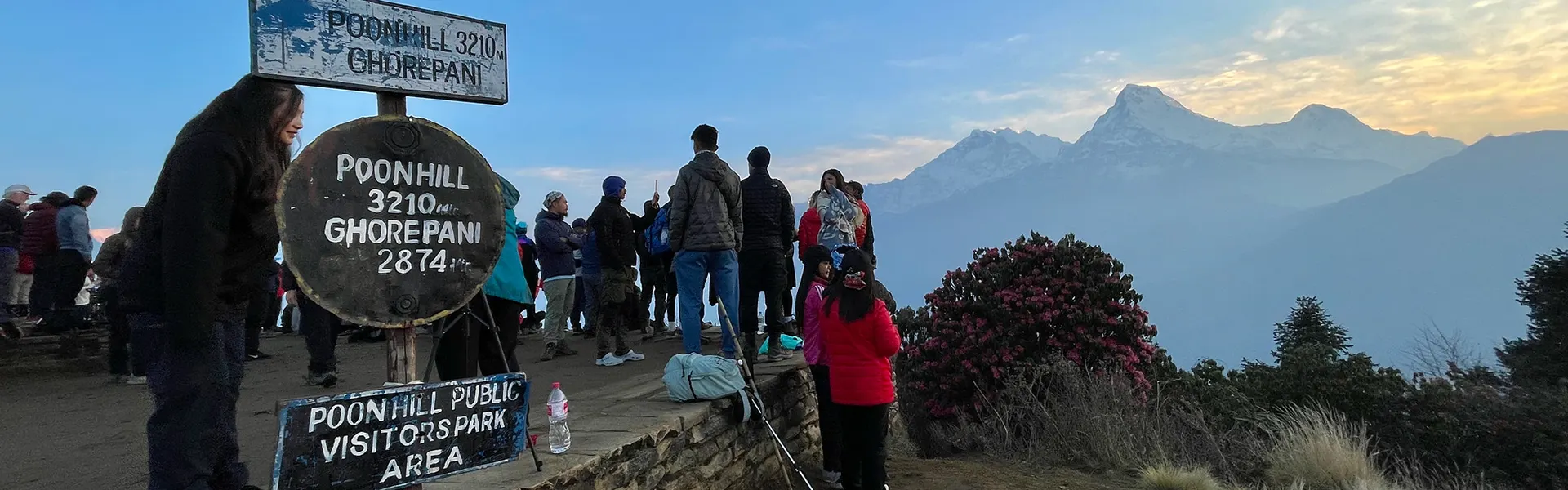 Hikers gather at the Poon Hill summit to watch the spectacular sunrise over the snow-capped Himalayan peaks. This is a must-do trek for our Beginner's Guide to Hiking.